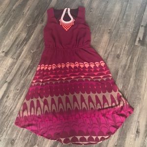 A sleeveless multi-colored dress